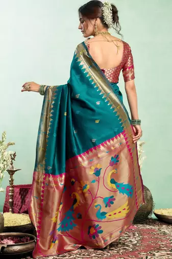 Teal blue silk blend banarasi saree with unstitched blouse piece