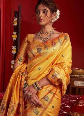 Yellow silk blend banarasi saree with unstitched blouse piece 1