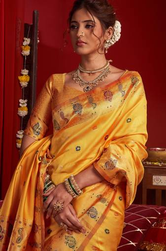 Yellow silk blend banarasi saree with unstitched blouse piece