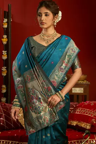 Teal blue silk blend banarasi saree with unstitched blouse piece