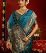 Teal blue silk blend banarasi saree with unstitched blouse piece