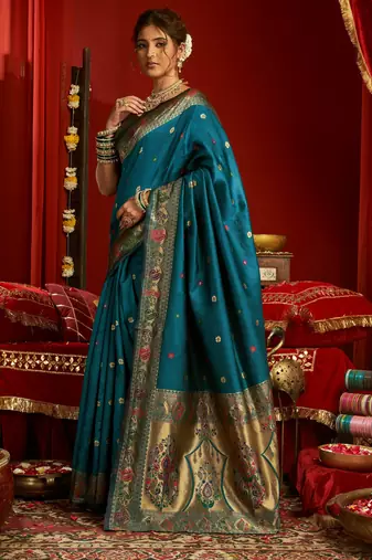Teal blue silk blend banarasi saree with unstitched blouse piece
