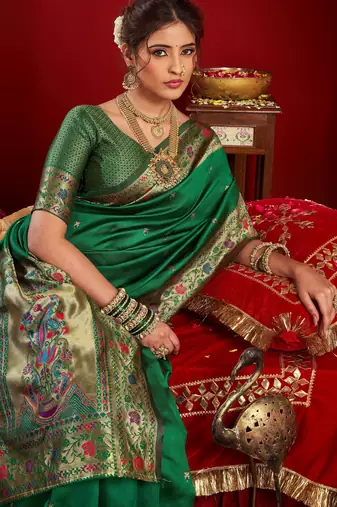 Green silk blend banarasi saree with unstitched blouse piece