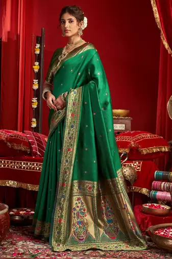 Green silk blend banarasi saree with unstitched blouse piece