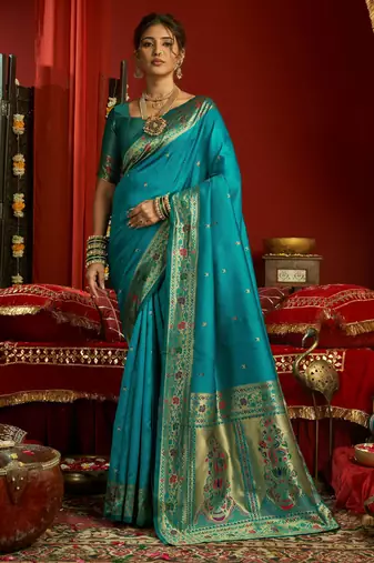 Teal blue silk blend banarasi saree with unstitched blouse piece