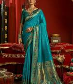 Teal blue silk blend banarasi saree with unstitched blouse piece
