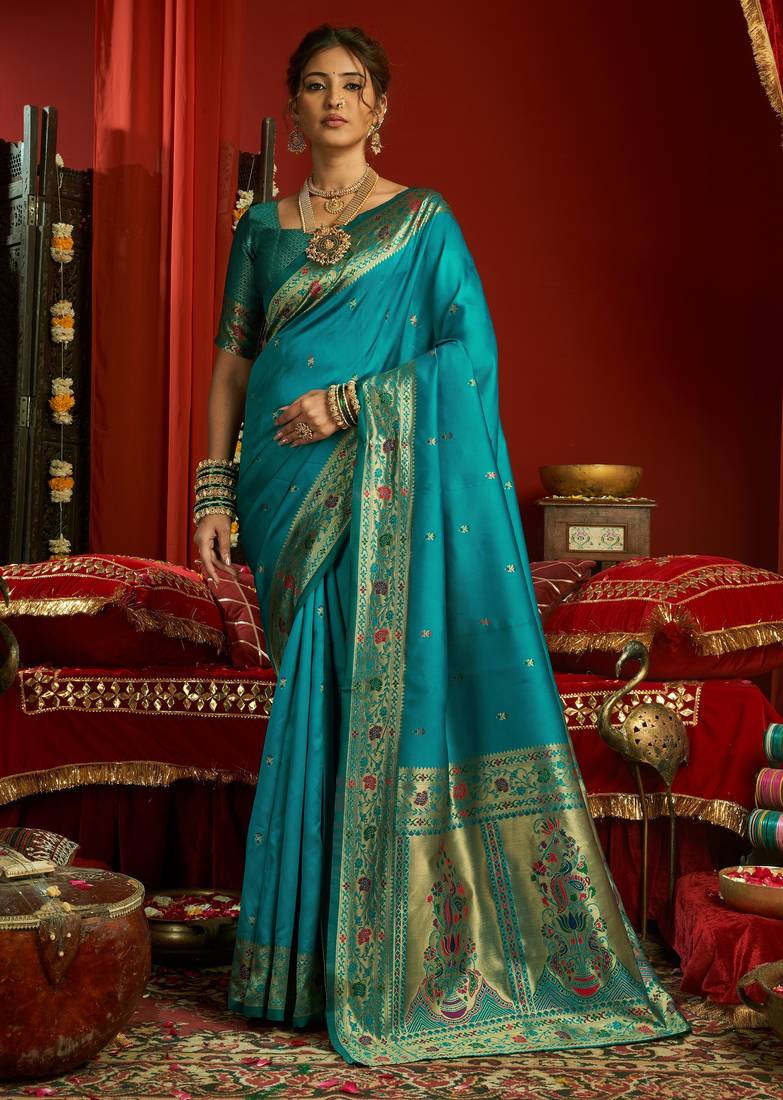 Teal blue soft silk blend banarasi jacuard work designer party wear saree with unstitched blouse piece