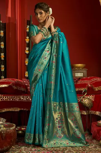 Teal blue silk blend banarasi saree with unstitched blouse piece
