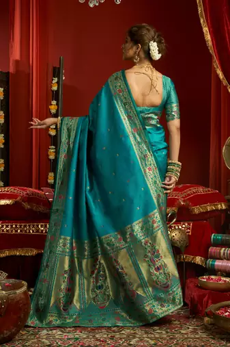 Teal blue silk blend banarasi saree with unstitched blouse piece