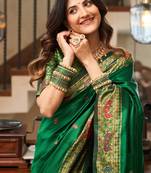 Green silk blend banarasi saree with unstitched blouse piece