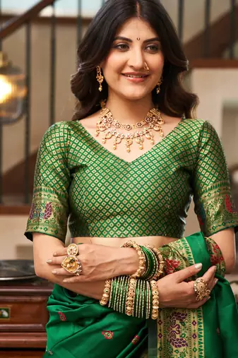 Green silk blend banarasi saree with unstitched blouse piece