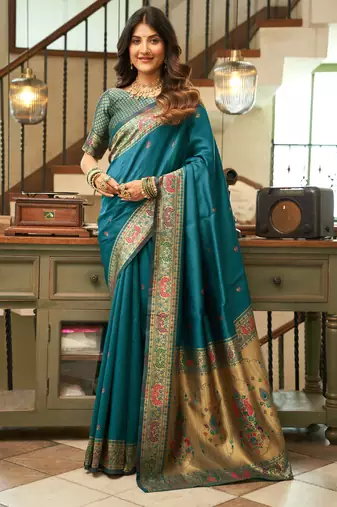 Teal blue silk blend banarasi saree with unstitched blouse piece