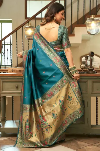 Teal blue silk blend banarasi saree with unstitched blouse piece