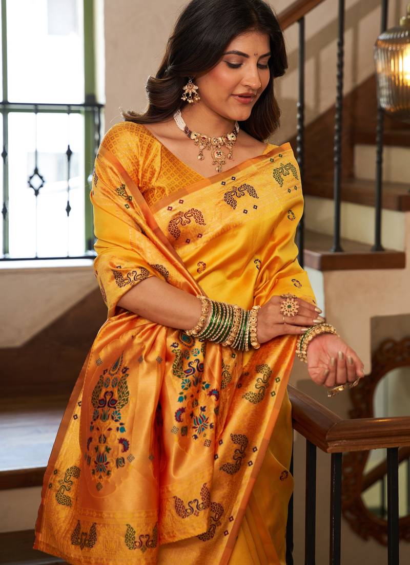 Yellow soft silk blend banarasi jacuard work designer party wear saree with unstitched blouse piece
