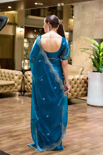 Turquoise shimmer chiffon embroidery saree with unstitched blouse piece
