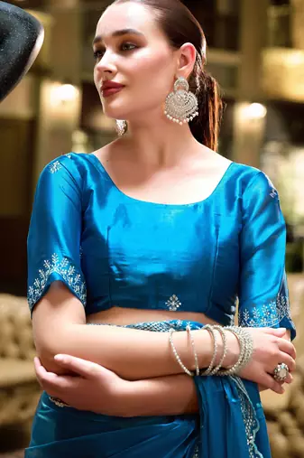 Turquoise shimmer chiffon embroidery saree with unstitched blouse piece