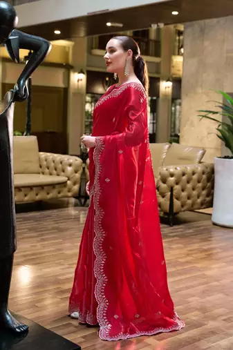 Red shimmer chiffon embroidery saree with unstitched blouse piece