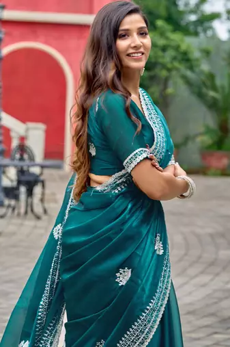 Bottle green shimmer chiffon embroidery saree with unstitched blouse piece