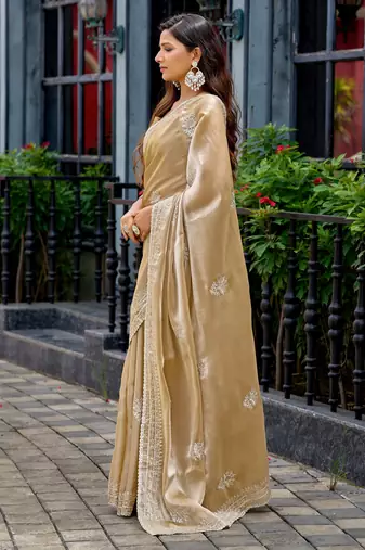 Gold shimmer chiffon embroidery saree with unstitched blouse piece