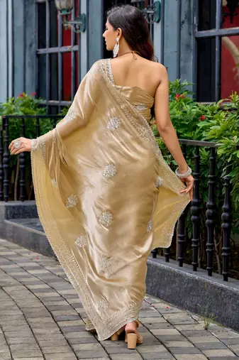 Gold shimmer chiffon embroidery saree with unstitched blouse piece