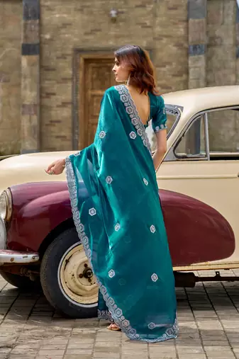 Teal green shimmer chiffon embroidery saree with unstitched blouse piece
