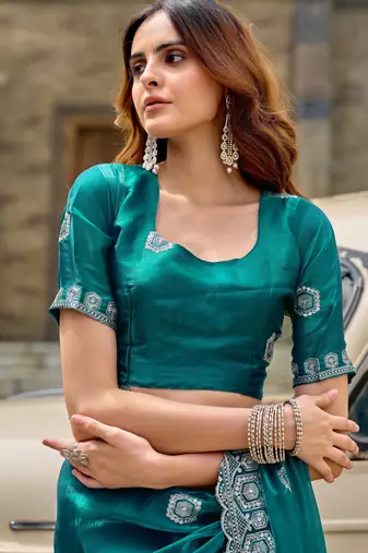 Teal green shimmer chiffon embroidery saree with unstitched blouse piece