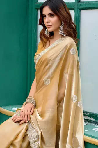 Gold shimmer chiffon embroidery saree with unstitched blouse piece