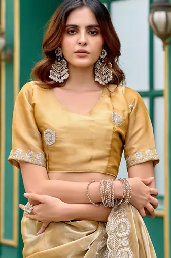 Gold shimmer chiffon embroidery saree with unstitched blouse piece