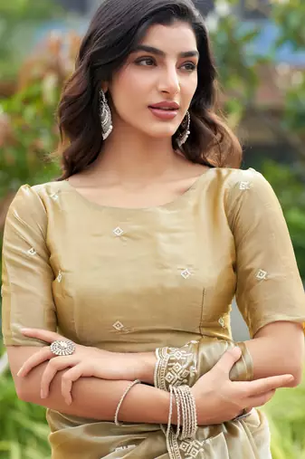 Gold shimmer chiffon embroidery saree with unstitched blouse piece