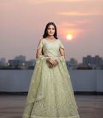 Light Yellow Net Embroidered Lehenga Choli Set With Dupatta And Blouse Piece