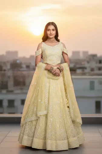 Women's Yellow Net Embroidered Semi-Stiched Lehenga Choli Set With Dupatta And Unstiched Blouse Piece