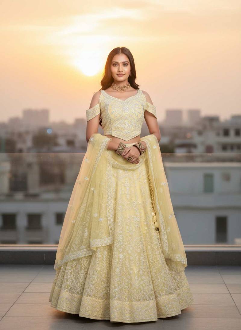 Women's Yellow Net Embroidered Semi-Stiched Lehenga Choli Set With Dupatta And Unstiched Blouse Piece