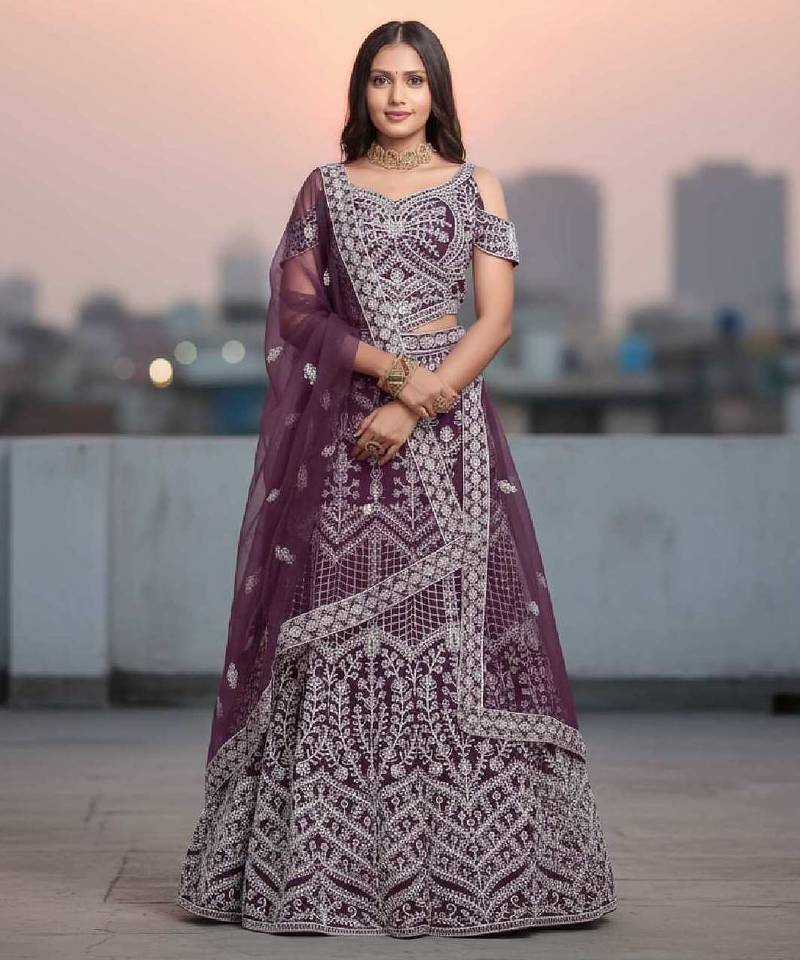Wine Net Embroidered Lehenga Choli Set With Dupatta And Blouse Piece