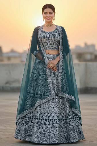 Teal Blue Net Embroidered Lehenga Choli Set With Dupatta And Blouse Piece