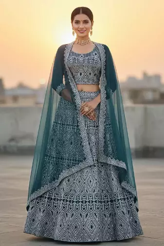Teal Blue Net Embroidered Lehenga Choli Set With Dupatta And Blouse Piece