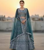 Teal Blue Net Embroidered Lehenga Choli Set With Dupatta And Blouse Piece