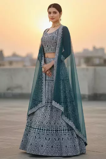 Teal Blue Net Embroidered Lehenga Choli Set With Dupatta And Blouse Piece