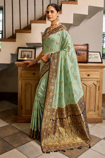 Sea green soft silk blend with woven work designer party wear festive saree with unstitched blouse piece