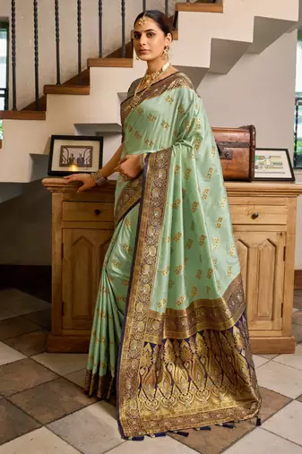 Sea green soft silk blend with woven work designer party wear festive saree with unstitched blouse piece