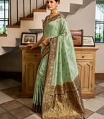 Sea green silk blend with woven saree with unstitched blouse piece