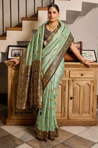Sea green silk blend with woven saree with unstitched blouse piece