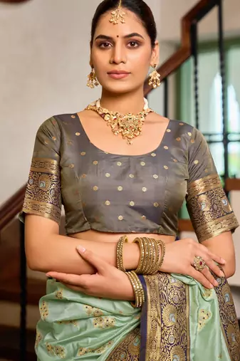 Sea green silk blend with woven saree with unstitched blouse piece