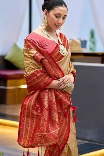 Cream red silk blend with woven saree with unstitched blouse piece