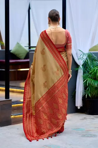 Cream red silk blend with woven saree with unstitched blouse piece