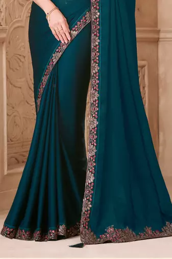 Teal satin georgette embroidered saree with unstitched blouse piece