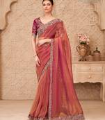 Rust georgette embroidered saree with unstitched blouse piece