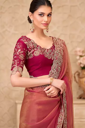 Rust georgette embroidered saree with unstitched blouse piece