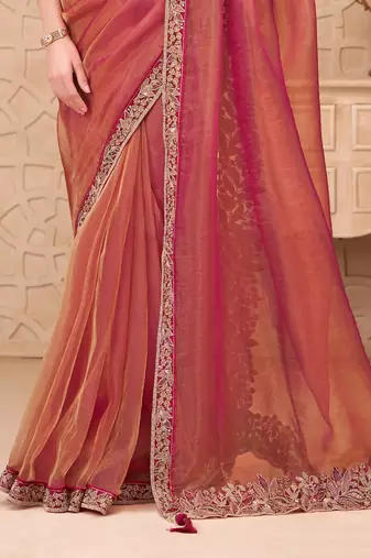 Rust georgette embroidered saree with unstitched blouse piece
