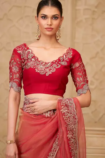 Rust georgette embroidered saree with unstitched blouse piece