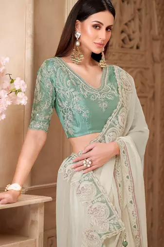 Cream georgette silk blend embroidered saree with unstitched blouse piece